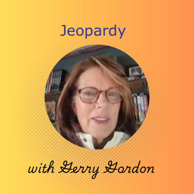 Accessible image of Terry Gordon, a faculty member, with bookshelves in the background.