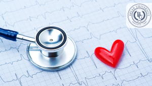 Close-up of a stethoscope and red heart on ECG paper, representing healthcare and medical professionalism.