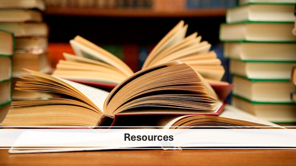 Open books and stacked textbooks at the BU Resource Center, a hub for academic resources and student support at Bryan University.